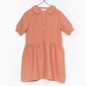 Play Up linen dress in a terracotta color